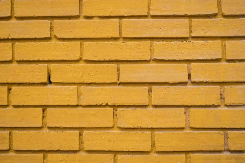 Mustard Painted Brick
