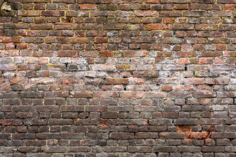 Weathered Brown Brick Wall