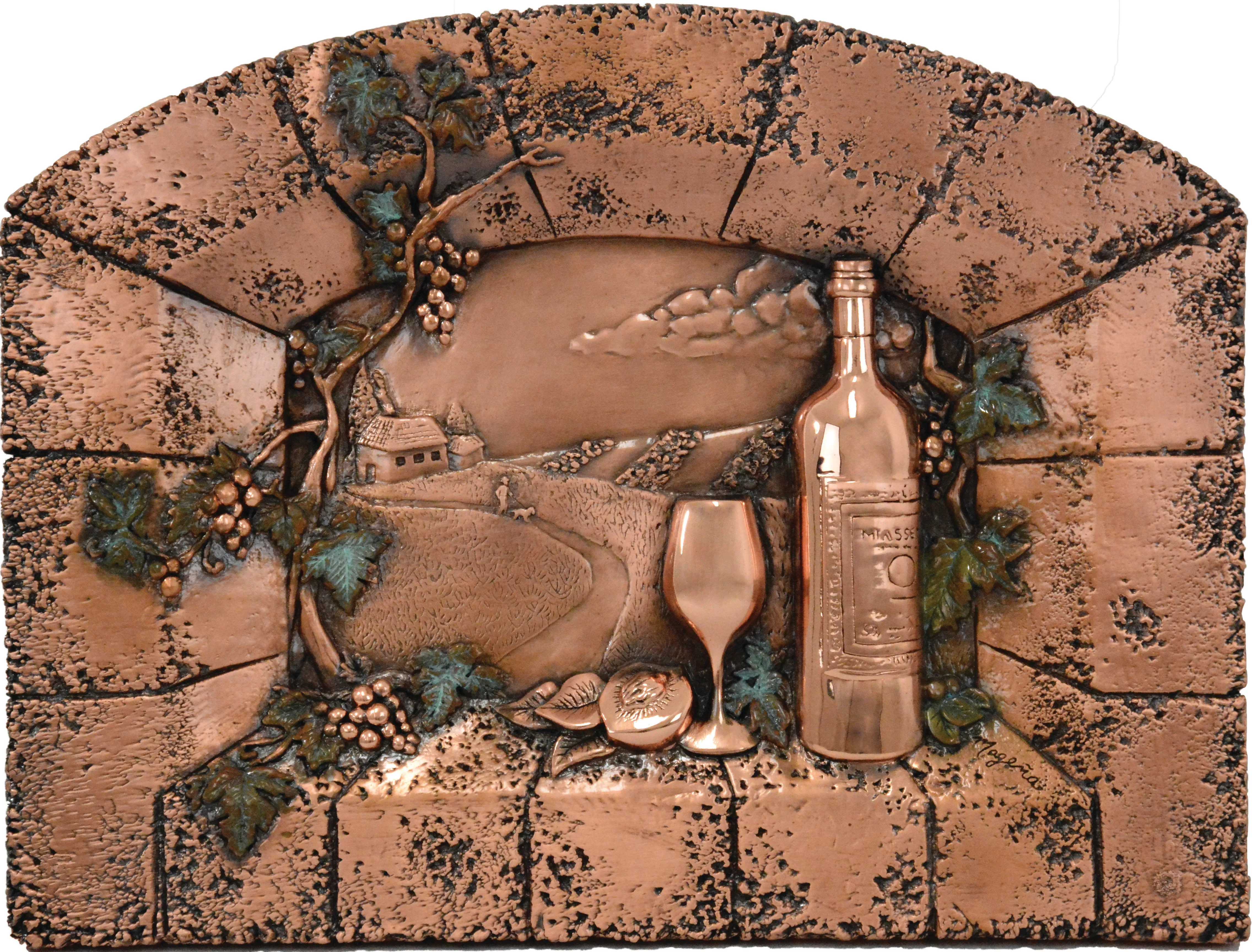 A copper relief of a wine bottle, glasses and grapes beneath a rustic stone-style arch