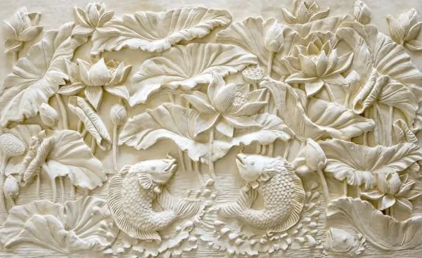 Two koi fish swim beneath lotus leaves and blooms in a soft ivory relief