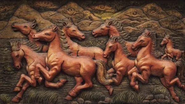 A herd of chestnut horses gallops along a riverbank beneath rolling hills, in rich painted relief