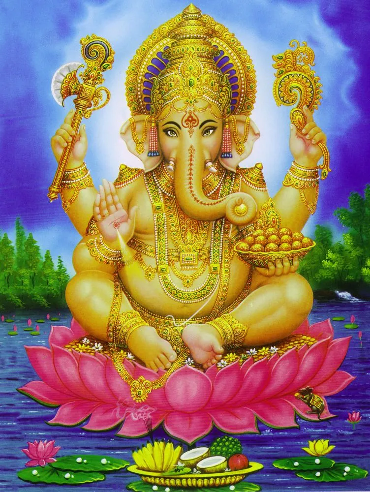 A golden Ganesha seated on a large pink lotus floating on a pond, with a lake and blue sky beyond