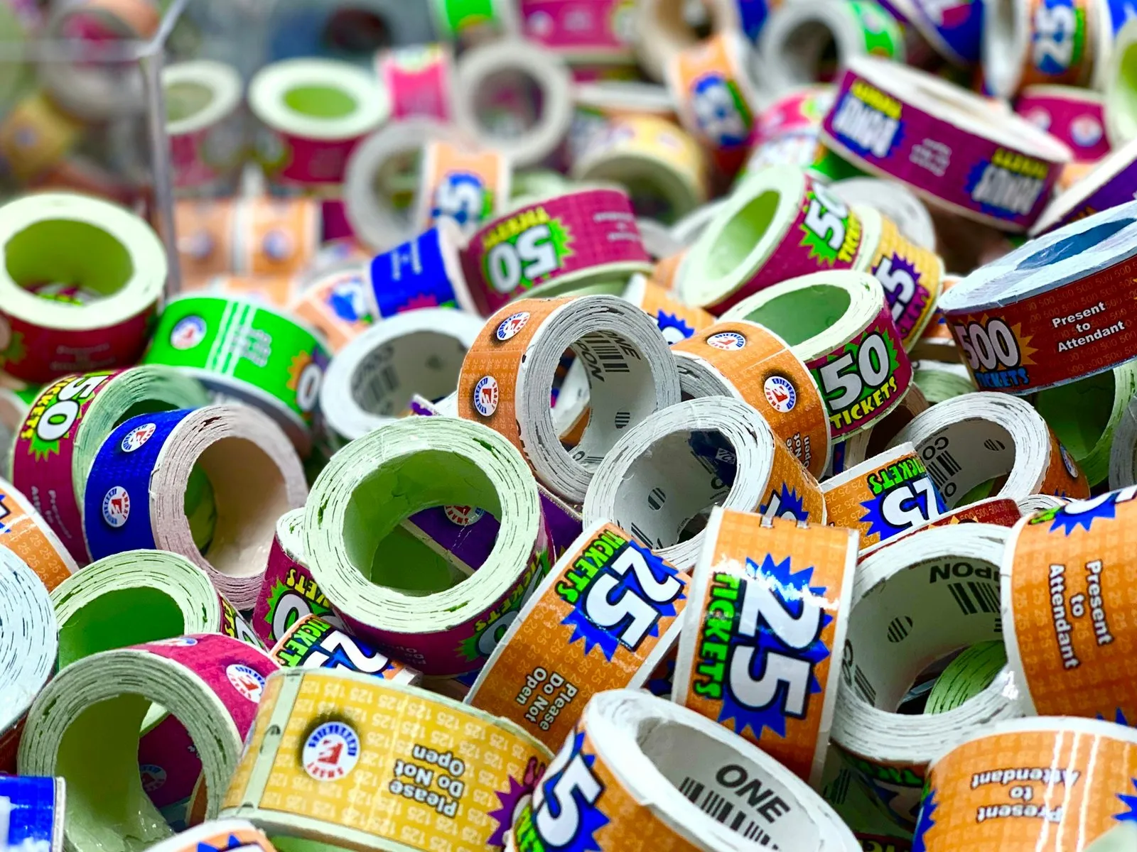 Rolls of assorted colorful printed stickers