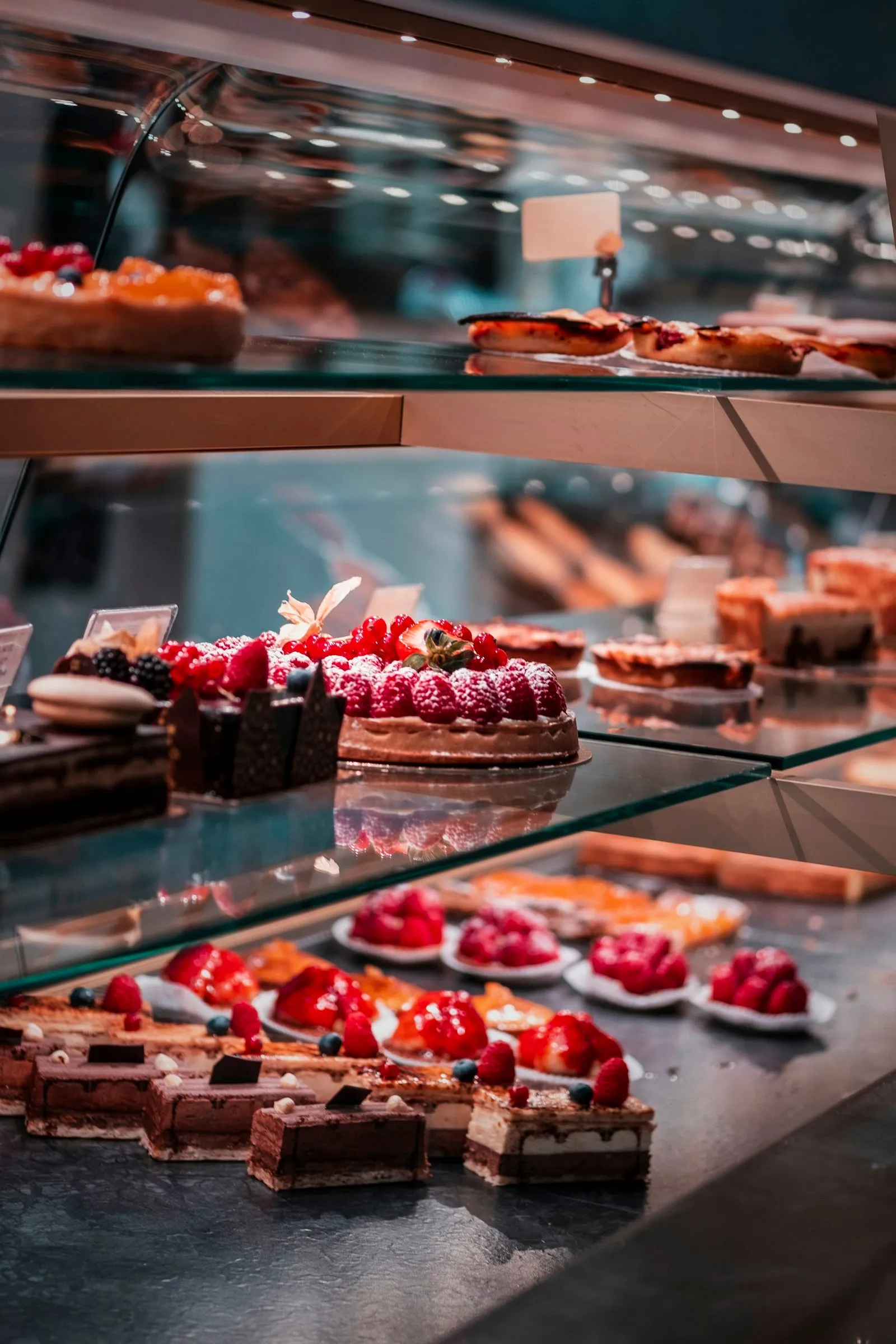 Fruit tarts and pastries in a bakery display