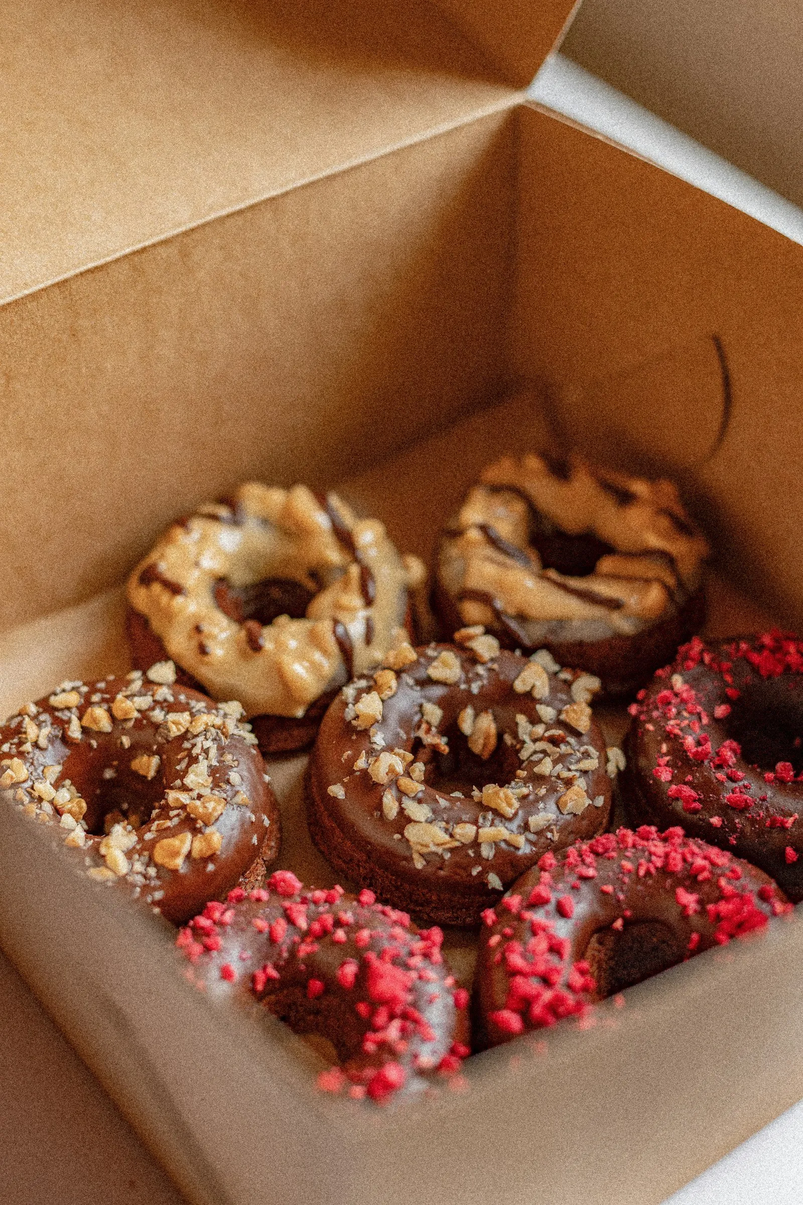 A bakery box with donuts