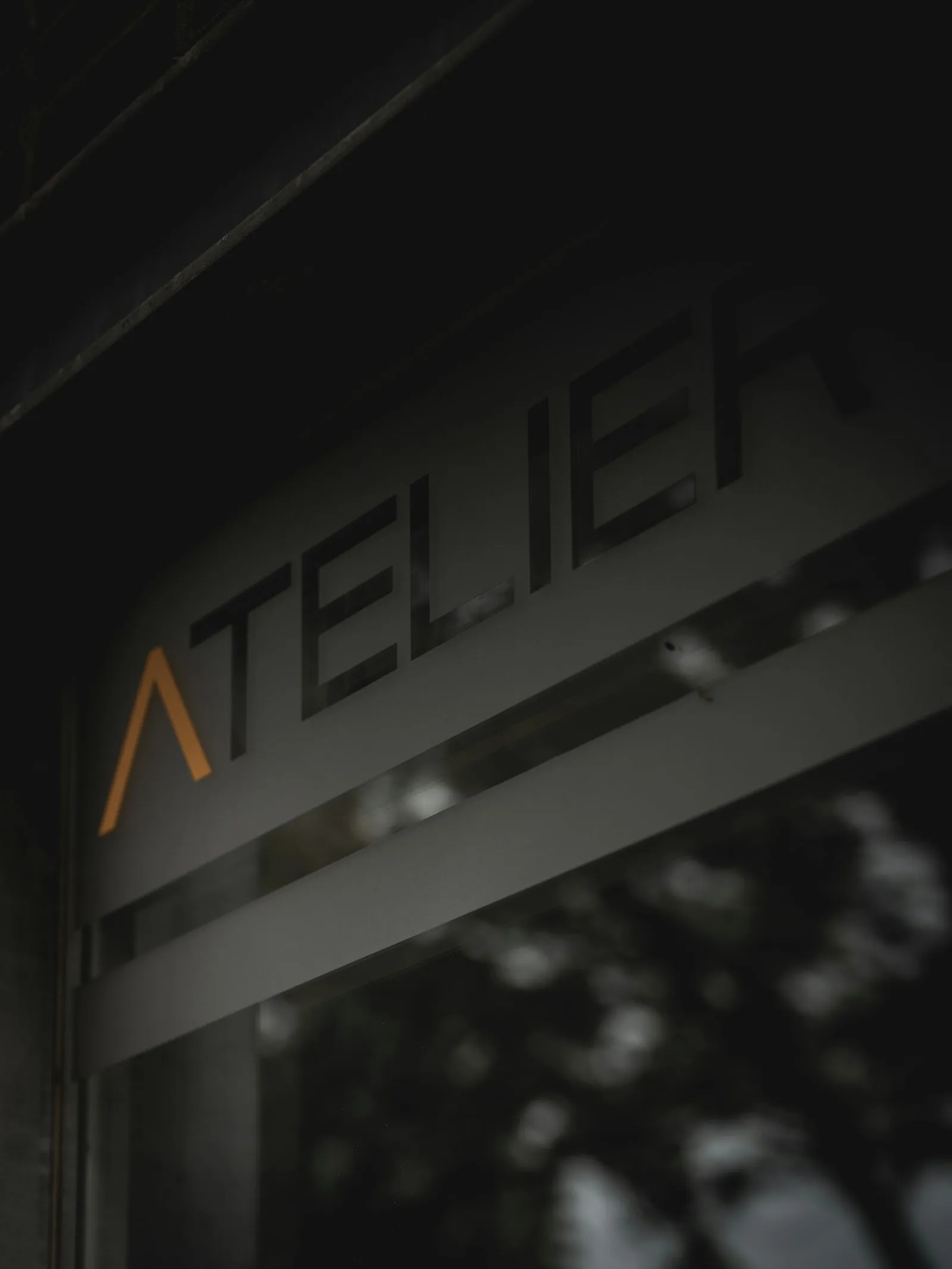 A business sign on glass