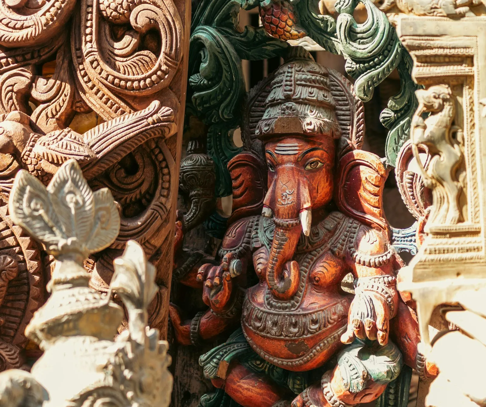 Ornate wooden carving of a Hindu deity