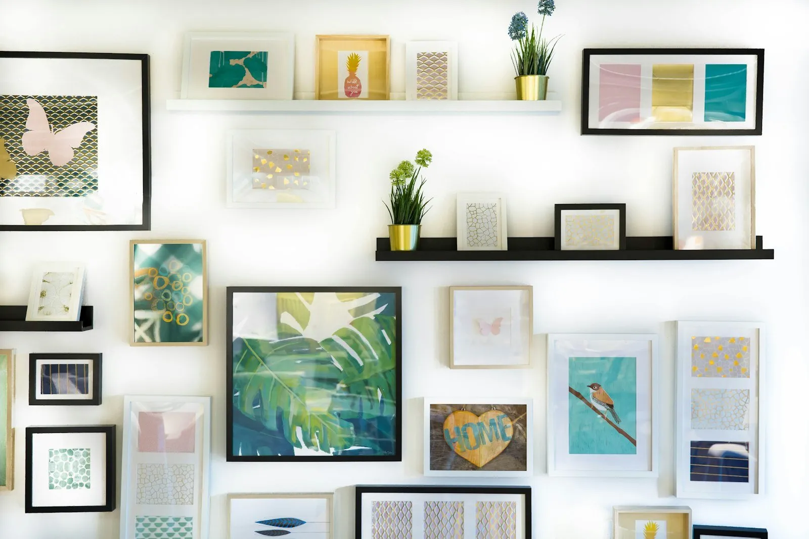 Assorted-color framed paintings on a wall
