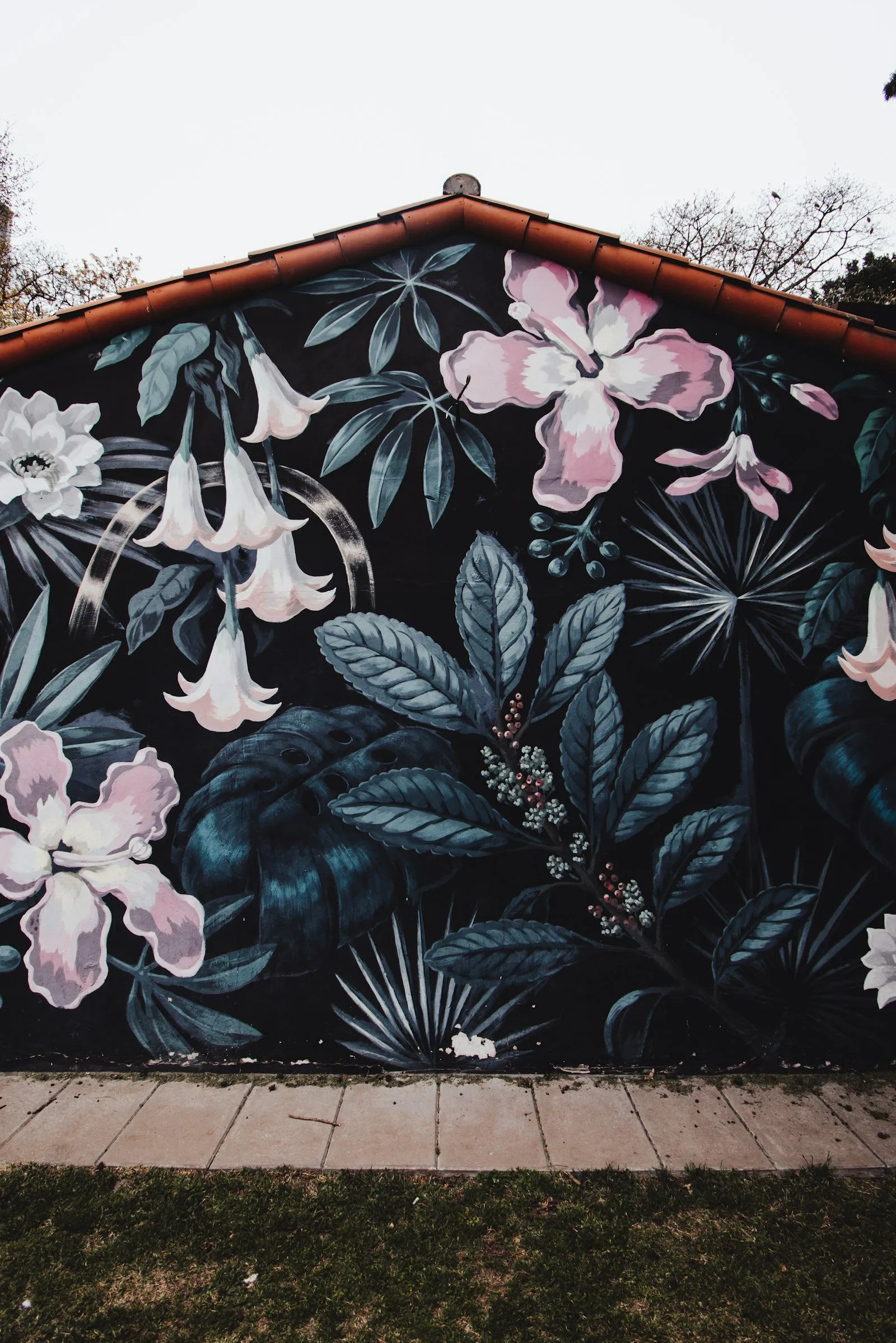 Large-scale floral mural on a building